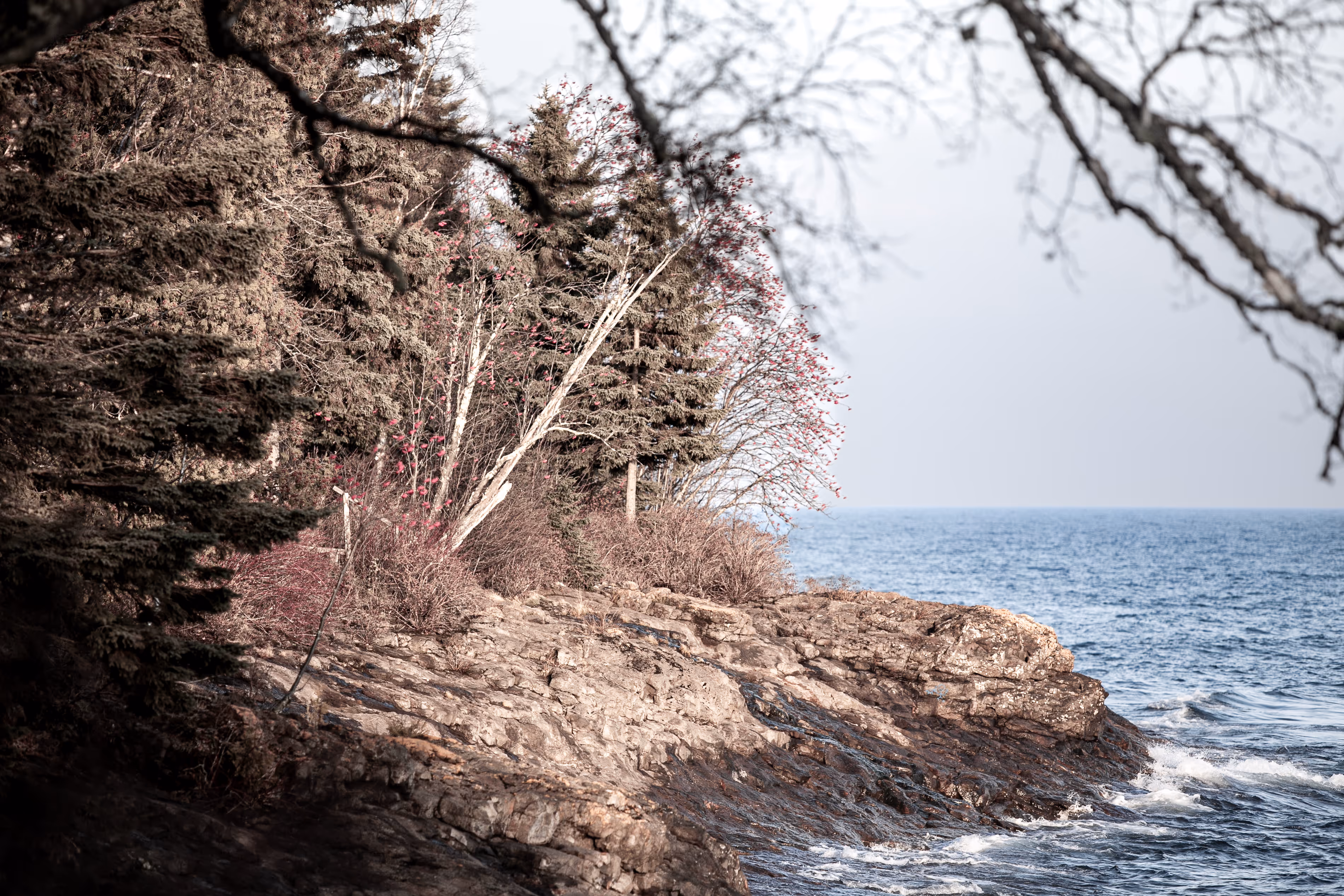 The North Shore of Lake Superior near Two Harbors, Minnesota: autumn shoreline, granite ledge, slate-gray water